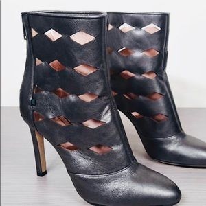 Italian leather ankle gunmetal cage booties.
